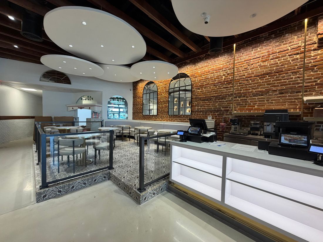 Restaurant dining room lighting with recessed cloud ceilings and accent lighting in Tarpon Springs FL